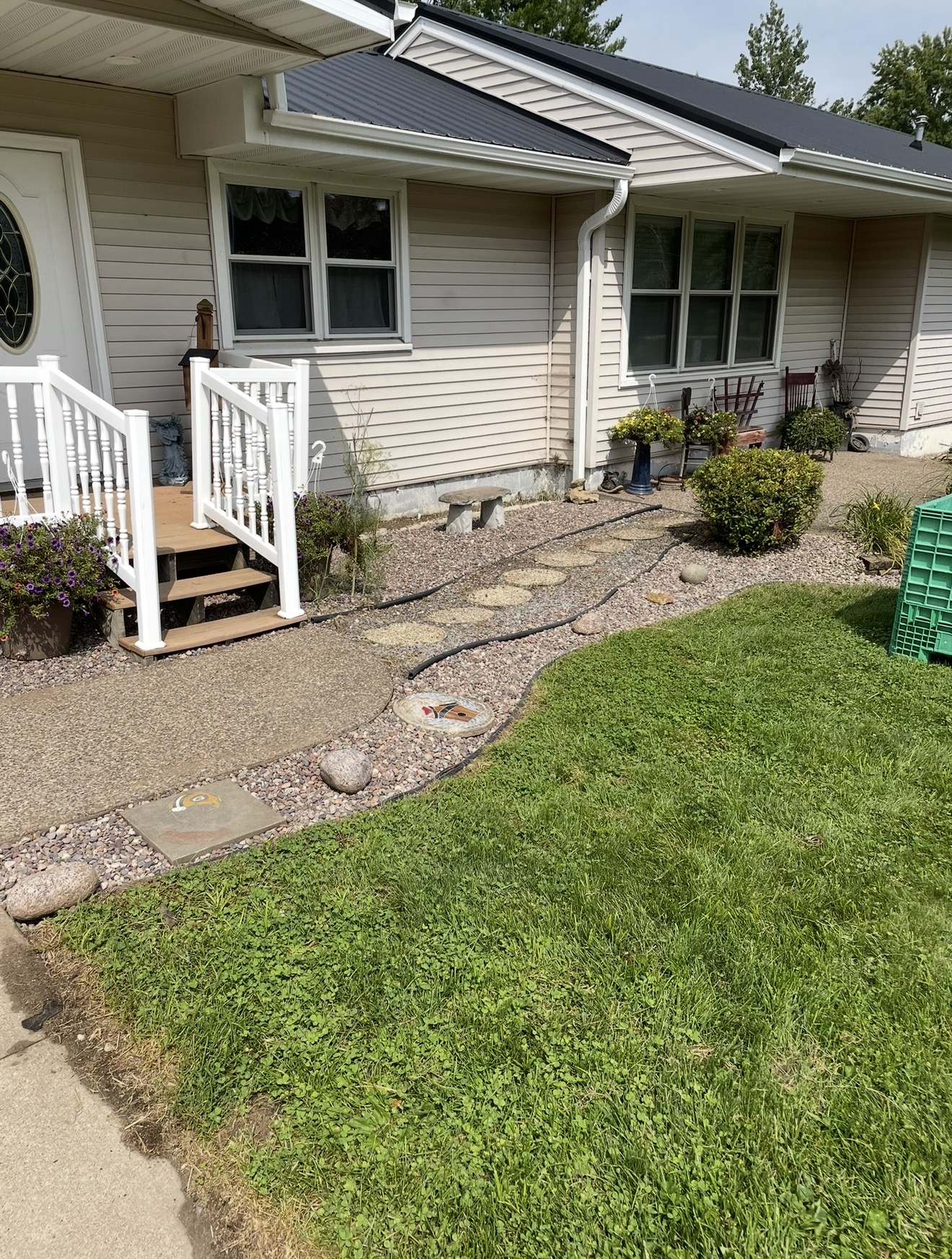 Stepping-stone walkway and landscape beds at a client's home